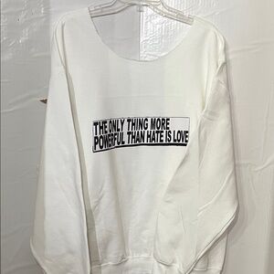 White Off-the-Shoulder Sweater. It’s off the shoulder can be worn front or back